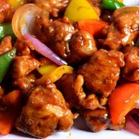 Chili Chicken · Diced chicken tossed with onion, capsicum and chilies in oyster and soy sauces