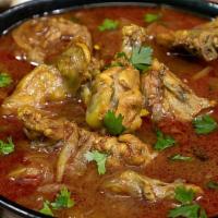Dhaba Style Chicken Curry · Slow cooked chicken curry made with spice marinated chicken and then sautéed with gravy of o...