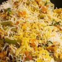 Veg Dum Biryani - Family Pack · Vegetable biryani  prepared by layering the biryani gravy , vegetables and  basmati rice.