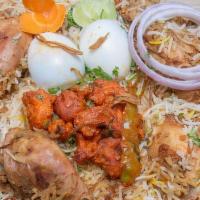 Orugallu Spl Chicken Biryani - Family Pack · A delightful preparation of richly flavored aromatic rice layered with marinated chicken dum...