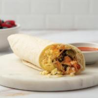 Spicy Veggie · A flour tortilla stuffed with scrambled eggs, melty cheese, salsa verde, poblano peppers, an...