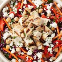 Mediterranean Chickpea Bowl · The sun shines on this bowl, including brown rice quinoa blend, grilled chicken, marinated a...