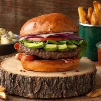 Bacon Avocado Burger · When burgers taste this good, there’s no right or wrong way to dress them. But we added cris...