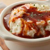 Mashed Potatoes & Gravy · Why mess with a classic. Pan sauce gravy served over whipped mashed potatoes. No need to sta...