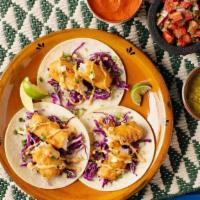 Baja Fish Tacos (3 Pack) · A baja style fish taco featuring battered and fried cod, red cabbage slaw, chipotle mayo and...