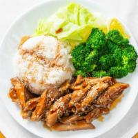 Chicken Teriyaki · Steamed white rice served with grilled slices of chicken and steamed vegetable.