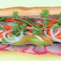 Bbq Pork · BBQ pork, house pate sauce , cucumber , carrot and daikon mixed pickle, cilantro.