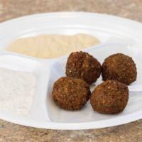 Falafel (4 Pcs) · Ground chickpeas, blended with spices & vegetables.