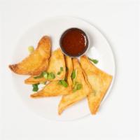 Crab Cream Cheese Wontons (5) · house-made, with pineapple chili sauce.