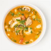 Tom-Yum Soup (Gf) · 24 oz. hot and sour soup, chili, lemongrass, lime leaf, mushroom, lime, tomato, onions.