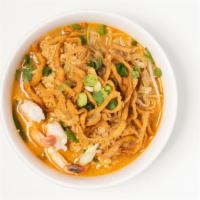 Tom-Yum Noodle Soup · crispy & steamed egg noodle in hot & sour soup, peanut, ground chicken, shrimp, beansprout, ...