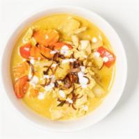 Kaeng Kari (Gf, Vg) · milder spice turmeric-yellow curry,
potato, carrot, onions, red bell.