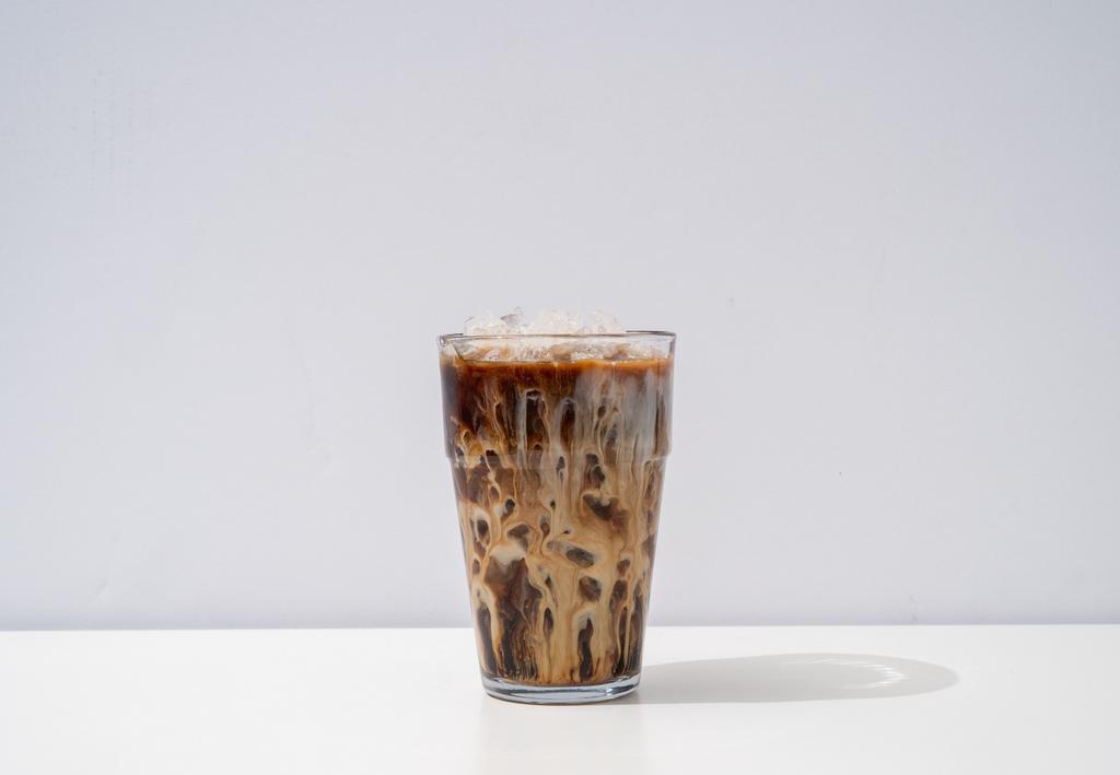 Thai Milk Coffee · sweetened Thai coffee with house cream or coconut milk (vegan).  for the best tasting, we will not deliver with ice as it could water down.
