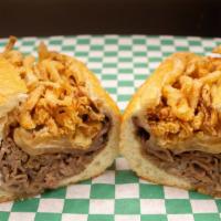 Hot Beef & Cheddar · Au jus dipped roast beef, cheddar and horseradish cream with grilled and fried onions.