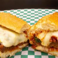 Spicy Sausage Marinara · Breaded and fried spicy ground pork, house red sauce, aged mozzarella, parm and basil.