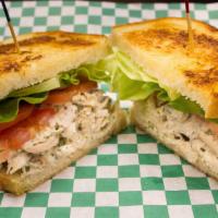 Chicken Salad Sandwich · Marinated grilled chicken, butter lettuce, and tomato on Sourdough.
