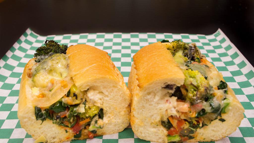Hot Veg Supreme · Roasted mushrooms and  red peppers, kale, grilled onion, artichoke hearts, herb aioli, and mozzarella.
