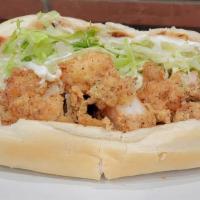 Shrimp Po Boy · Shredded lettuce, tomatoes and our own Spicey Mayo. Includes choice of chip.
