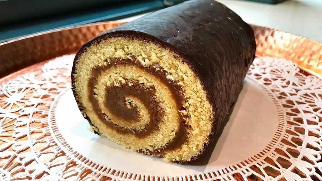 Choco Roll - Whole · Artisan sponge cake, dulce de leche, chocolate.