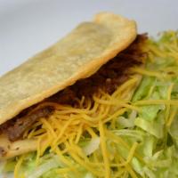 Beef Taco · Hard Shell, Shredded beef, lettuce and cheese