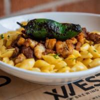 Green Chili Mac N' Cheese · Our crowd-pleasing brewers mac and cheese is made with smoked gouda and comes topped with ou...