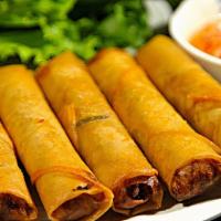 Egg Rolls (4) · fried rolls filled with pork, taro, carrot, onion and clear vermicelli
*served with sweet ch...