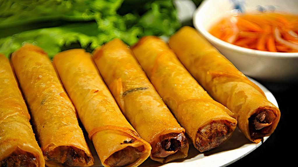Egg Rolls (4) · fried rolls filled with pork, taro, carrot, onion and clear vermicelli
*served with sweet chili sauce.