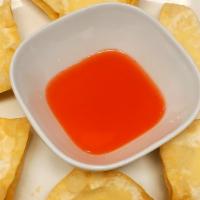 Cream Cheese Wontons (6) · fried wontons filled with cream cheese 
*served with sweet and sour sauce
