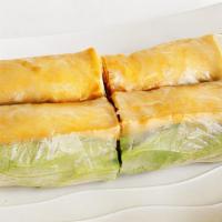 Tofu Spring Rolls (2) · fried tofu wrapped in rice paper with lettuce and rice noodles 
*served with peanut sauce.