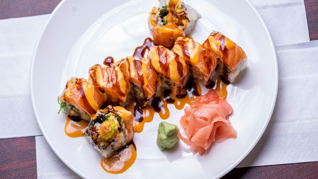 Jimmy Roll · Fried tempura shrimp, avocado, and seaweed salad, with salmon, eel sauce, and spicy mayo on top.