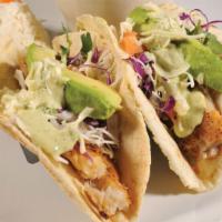 Fish Tacos · (2) Hand-made corn tortillas, delicious grilled fish, shredded green and red cabbage, cheese...