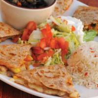 Grilled Chicken Quesadilla · Grilled chicken breast sautéed with veggies, light cheese and whole wheat tortilla. Served w...
