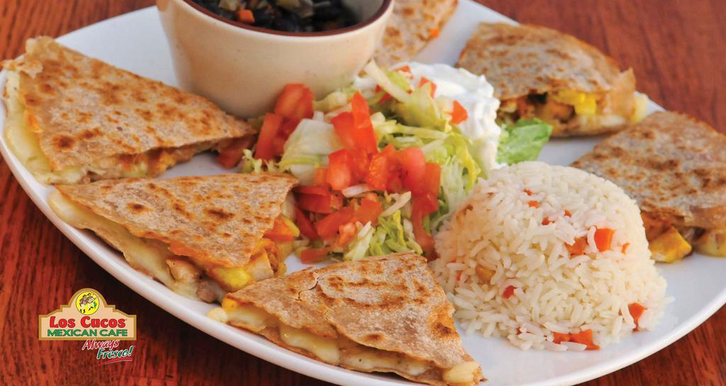Grilled Chicken Quesadilla · Grilled chicken breast sautéed with veggies, light cheese and whole wheat tortilla. Served with white rice and your choice of black beans or tortilla soup.