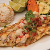 Grilled Fish Fillet · Grilled fish filet, lightly seasoned and grilled topped with sautéed crab meat. Served with ...