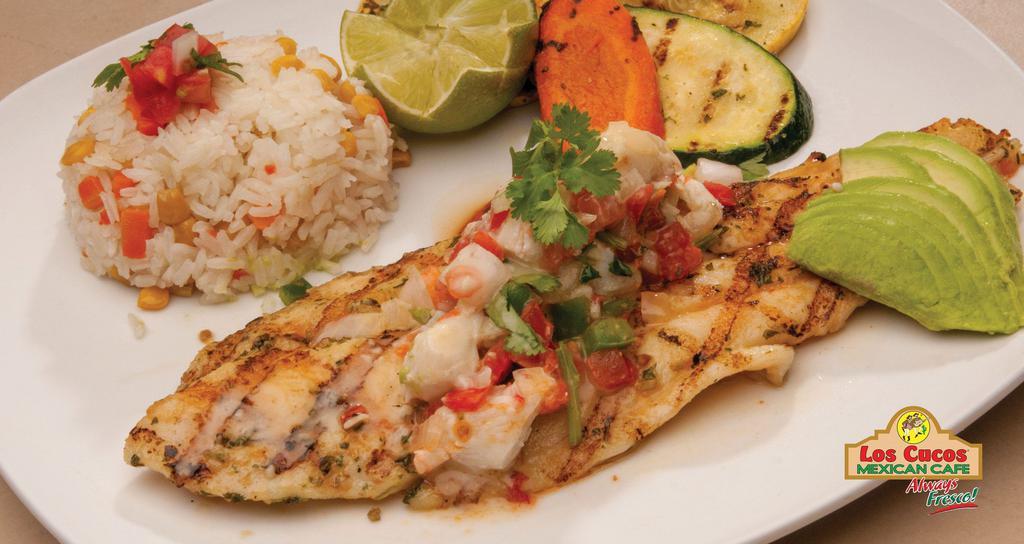 Grilled Fish Fillet · Grilled fish filet, lightly seasoned and grilled topped with sautéed crab meat. Served with grilled vegetables, with rice and avocado.