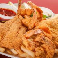 Mixto Frito · 2 pcs. of fish and 5 Jumbo Shrimp. Served with fries. If you prefer, you may order only shri...