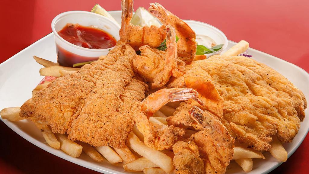 Mixto Frito · 2 pcs. of fish and 5 Jumbo Shrimp. Served with fries. If you prefer, you may order only shrimp or only fish.