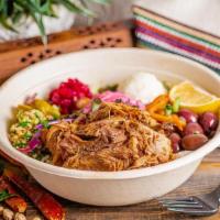 Hum Lamb · Slow braised in a tomato based broth with traditional Mediterranean herbs and spices until i...