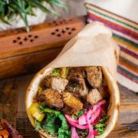 Pita Beef · Tender cuts of beef marinated in a unique blend of spices including coriander, cumin, and ca...
