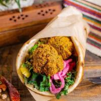 Pita Vegan Falafel · A blend of chickpeas, fava beans, fresh herbs and spices. Flash fried for a crunchy outside ...