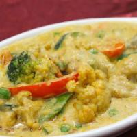 Veggie Korma · Gluten-free. A variety of vegetables and cashews in onion-based curry sauce, cream, and spic...