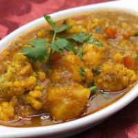 Aloo Govi · Gluten-free. Cauliflower & Potatoes cooked Nepalese style in tomato and onion-based curry sa...