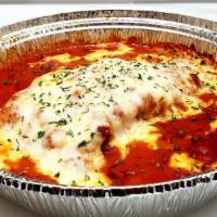 Meat & Cheese Lasagna · Served with side salad and garlic bread.
