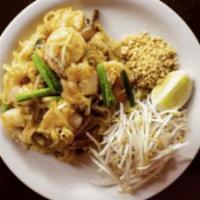 Pad Thai · Stir fried fresh thin rice noodles with bean sprouts, egg, chives and Pad Thai sauce with gr...