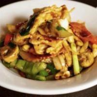 Cashew Stir Fry · Stir fried roasted chili paste with cashews, carrots, garlic, onions, mushrooms, and bell pe...
