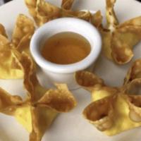 Crab Cheese Wontons · Traditional crab cheese wontons. Served with sweet chili sauce.