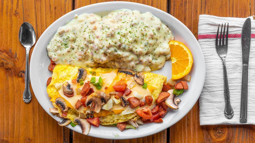 Monroe Omelet · German sausage, swiss, cheddar, peppers, onions, mushrooms, and tomatoes. With either Biscuits & Gravy or Hashbrowns and Toast