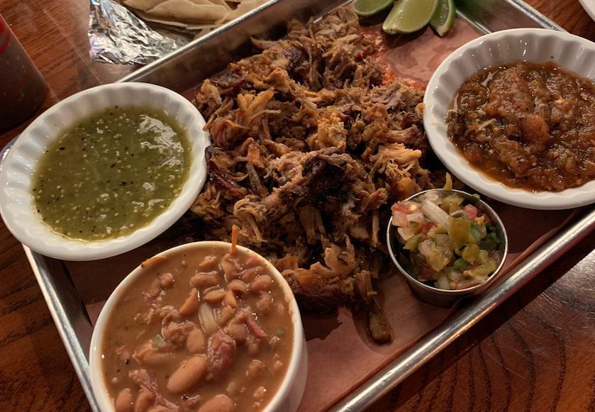 Pork Carnitas For Two · Applewood-smoked pulled pork shoulder, salsa verde, salsa roja, fire roasted mexican corn, fresh lime wedges, corn tortillas