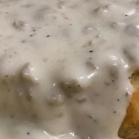 Homemade Biscuits & Gravy · Smothered in our homemade sausage gravy.