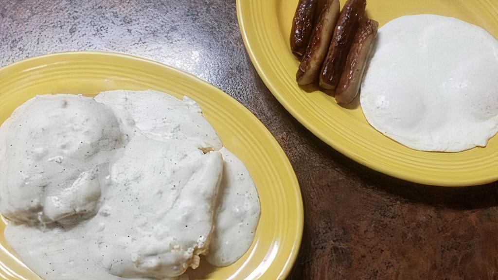 House Special · A 1/2 biscuit and gravy with 2 eggs and choice of 4 bacon strips, 4 sausage links or 2 sausage patties.